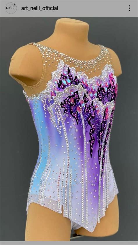 A Womans Leotard With Purple And Blue Designs On The Front In White