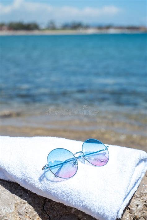 Sunglasses Lying On Tropical Sand Beach Party White Towel On Desk And