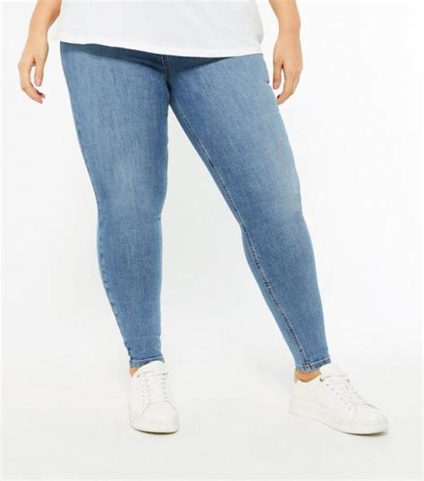 newlook curves blue mid wash lift and shape jenna skinny jeans drest