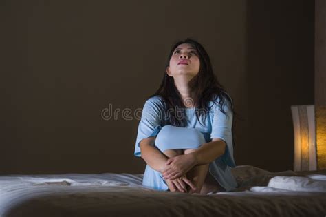Dramatic Portrait Of Young Beautiful And Sad Asian Japanese Woman