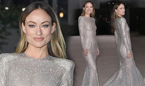 Olivia Wilde Goes Braless Under A Dazzling Sheer Silver Gown At The Academy Museum Gala In LA