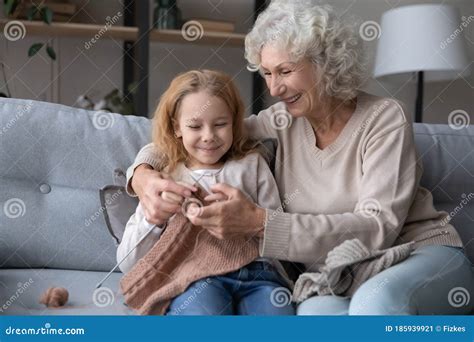 Caring Senior Grandmother Teach Knitting Little Granddaughter Stock Image Image Of Home Knit
