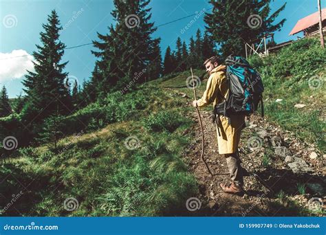 Traveler Man Climbing Up Of Green Mountain Hill Stock Image Image Of