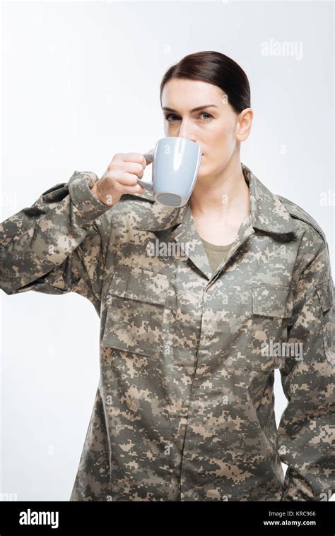 Musing Female Soldier Drinking Coffee Stock Photo Alamy