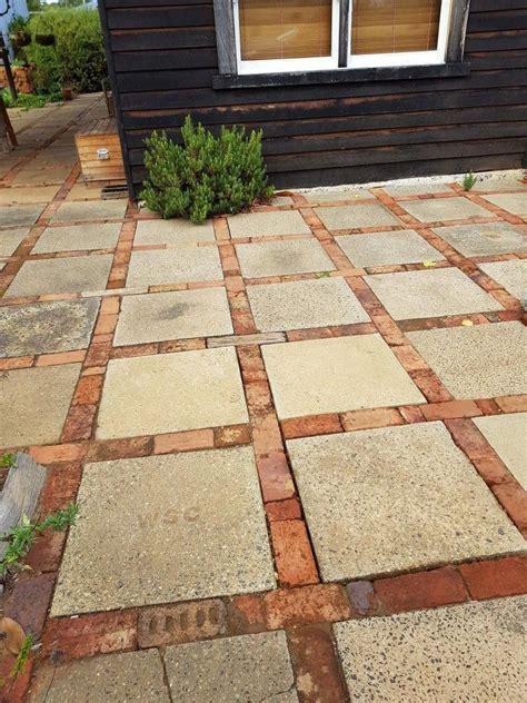 Hallelujah, the patio is done! This is a very simple and inexpensive solution to a patio ...