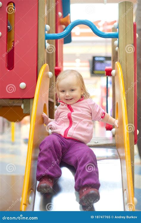 Adorable Baby Sliding Down Slide On Playground Stock Image Image Of