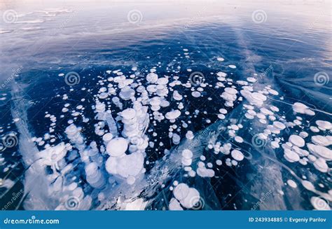 Gas Methane Bubbles Frozen In Winter Ice Of Lake Baikal Abstract