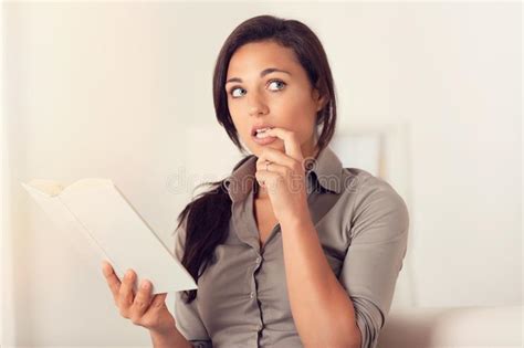 Pensive Woman Reading A Book On Couch At Home Stock Image Image Of Adult Attractive 119217081