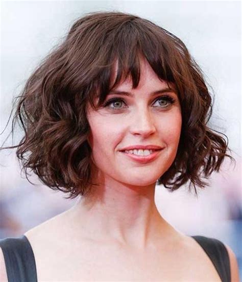 For a curly bob that translates your personality as young and quirky, try adding these piecey, slightly curved bangs. 15 Photo of Wavy Bob Hairstyles With Bangs