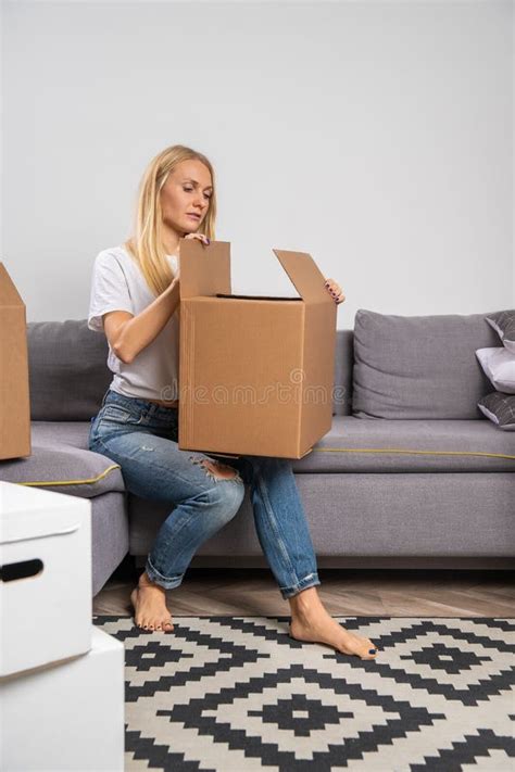 Woman With Two Big Cardboard Moving Boxes Isolated On White Stock Photo