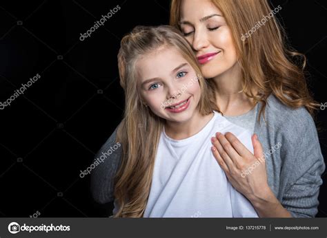 Mother And Daughter Embracing — Stock Photo © Igortishenko 137215778