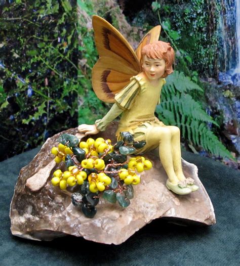 The Collectible Cicely Mary Barker Dandelion Fairy Happily Sits On The