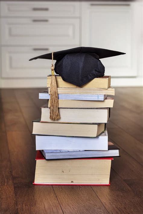 Graduation Hat On Books Stock Photo Image Of Degree 83340626