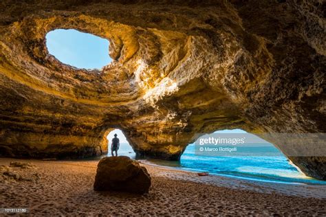Solitary Man Inside The Benagil Caves Portugal High Res Stock Photo