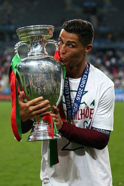 Euro2016 Cristiano Ronaldo Of Portugal Kisses The Trophy Following The