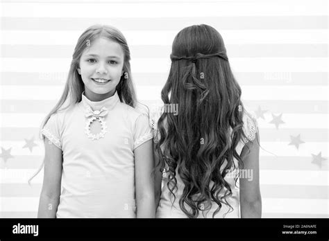 Best Hairstyles For Long Hair Cute Small Girls With Long Brunette And Blond Curls In Playroom