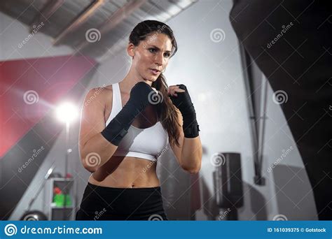 Portrait Of Sweaty Blonde Woman Take A Break After Intense Workout