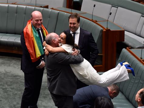2 Opposing Mps Hugging Illustrates Australia S Same Sex Marriage Vote