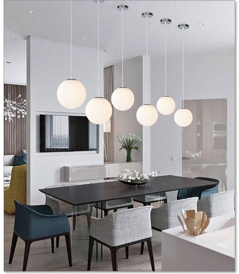 Suspension design à LED boule en verre blanche | Suspensions | Lumeers