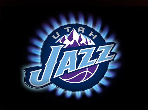 Jazz in sky blue against purple mountains in a blue circle. History of All Logos: All Utah Jazz Logos
