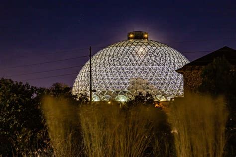 Night Scene Of The Desert Dome With The Moon Riding On The Side At