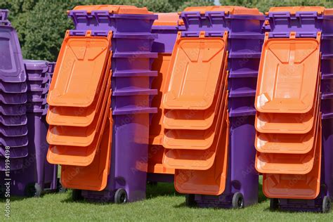 Stacks Of Plastic Rubbish Wheelie Bins Ready To Be Used At Festival