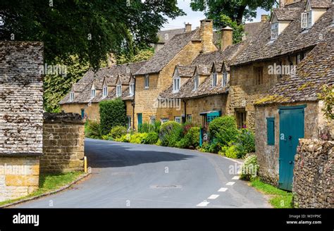 Stone Cottages In The Village Of Snowshill In The Cotswolds England