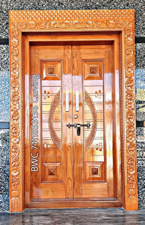 An Ornate Wooden Door With Glass Inserts On The Front And Side Panels