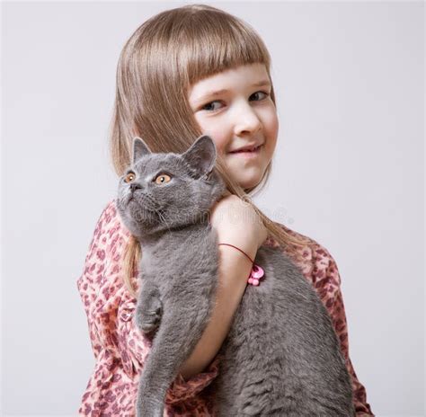 Happy Little Girl Holding A Cat Stock Image Image Of Kitten Indoor