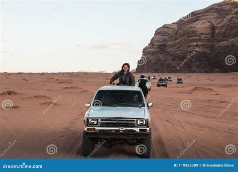 Bedouin`s Car Jeeps And Tourists In It In Wadi Rum Desert In Jordan