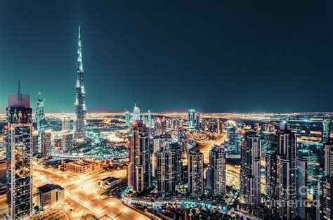 Fantastic Nighttime Skyline Of Dubai With Illuminated Skyscrapers