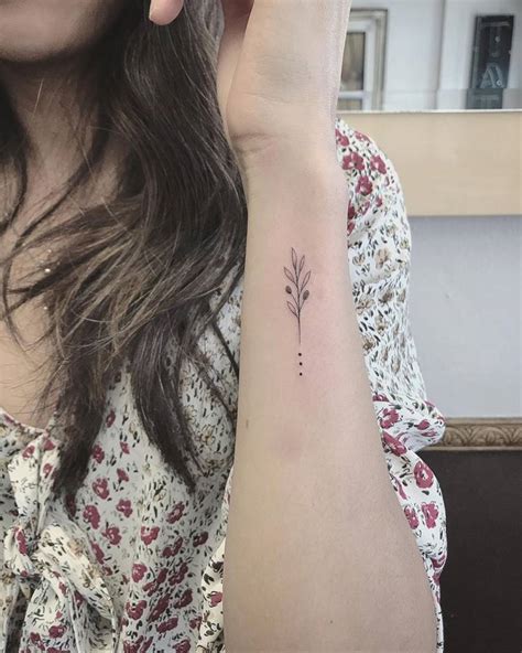 Single Needle Olive Branch Tattoo On The Wrist