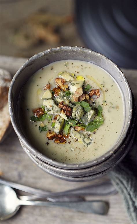 Creamy Cauliflower Pear And Blue Cheese Soup Topped With Chopped