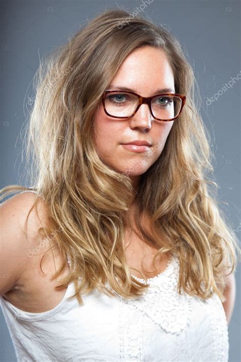 Pretty Woman With Long Brown Hair Wearing Glasses Fashion Studio Shot