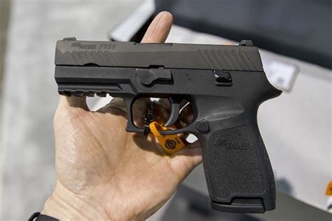 Sig Sauer P320 Pistol In 9mm 357 Sig And 40 Sandw The Firearm Blogthe