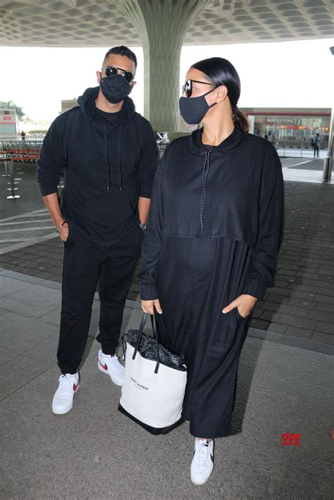 Neha Dhupia And Husband Angad Bedi Spotted At Airport Departure Hd Gallery Social News Xyz