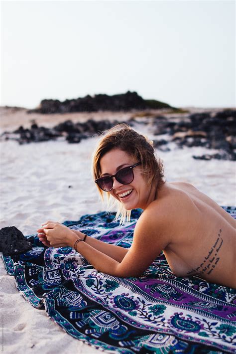 Portrait Of Smiling Woman On The Beach Del Colaborador De Stocksy Susana Ram Rez Stocksy