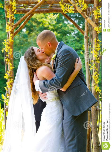 Wedding Ceremony Bride And Groom Kiss Stock Photos Image