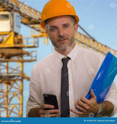 Corporate Portrait Of Young Attractive And Successful Engineer Man Or