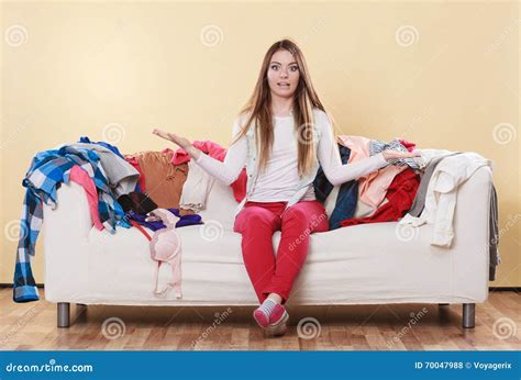 Helpless Woman Sitting On Sofa In Messy Room Home Stock Photo Image