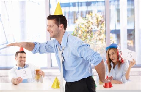 Young Man Having Fun At Office Party Stock Photo Image Of Handsome