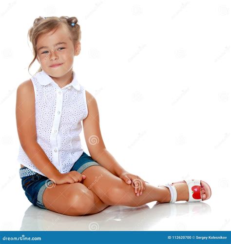 Little Girl Is Sitting On The Floor Stock Photo Image Of Cute