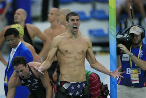 michael phelps celebrates after winning his 14th gold medal setting the all time record for