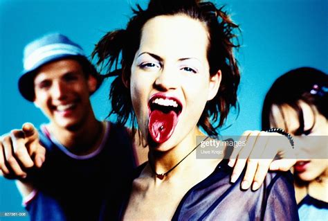 Group Of Teenagers Girl Revealing Pierced Tongue Closeup Photo Getty Images