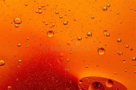 Abstract Colorful Background With Oil Drops And Waves On Water Surface