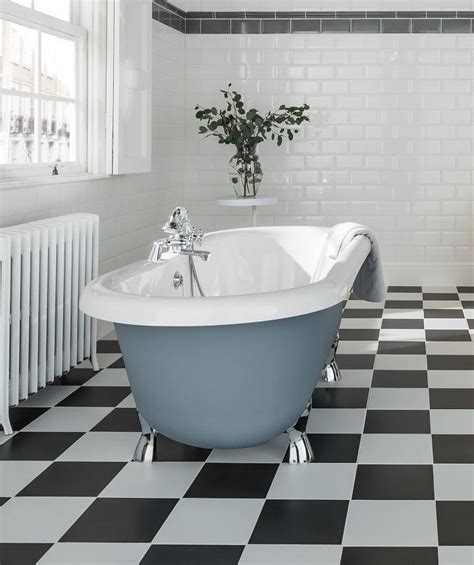 The inclusion of a wash basin is common. Checker™ Tile | Topps tiles, Tiles, Bathroom floor tiles