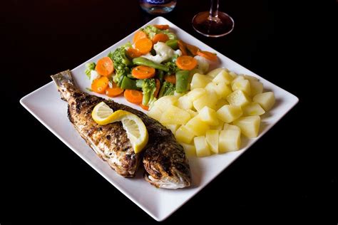 Grilled Fish With Potatoes And Frozen Vegetables Food Pictures