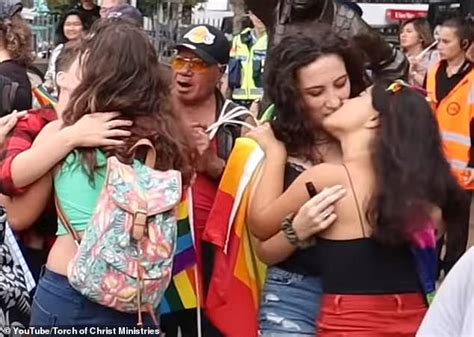 Defiant Lesbians Make Out As Extreme Christian Preacher Shouts During Gay Pride Parade In
