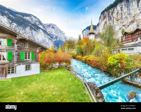 Stunning Autumn View Of Lauterbrunnen Village With Awesome Waterfall