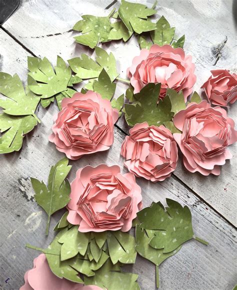 Make sure to watch the quick video to see exactly how i rolled the cricut flowers. Making Paper Flowers with a Cricut - Create and Babble